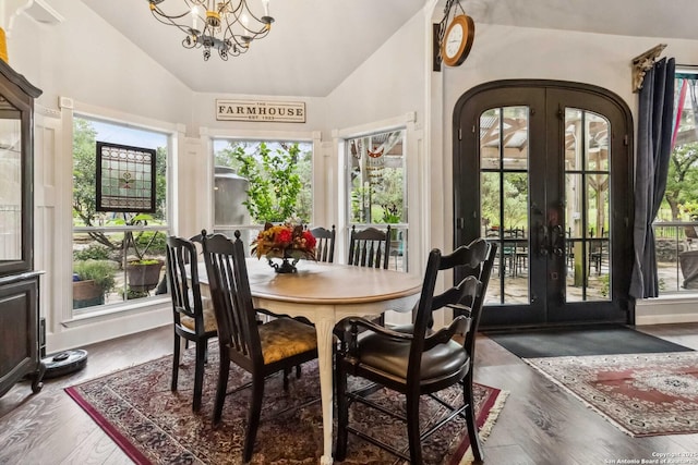 111 Kendall Oaks, Boerne, TX 78006 - dining space with french doors, a chandelier, wood finished floors, and high vaulted ceiling