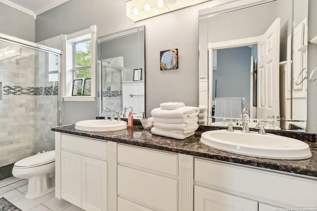 111 Kendall Oaks, Boerne, TX 78006 - full bathroom with a stall shower, ornamental molding, double vanity, and toilet