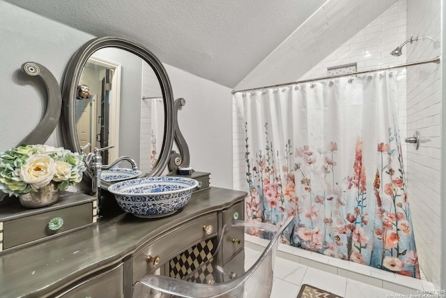 111 Kendall Oaks, Boerne, TX 78006 - full bath with lofted ceiling, a shower with curtain, vanity, and a textured ceiling