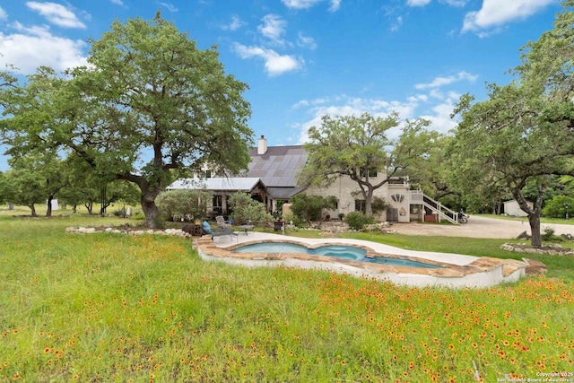 111 Kendall Oaks, Boerne, TX 78006 - view of swimming pool featuring a lawn, a pool with connected hot tub, and stairway