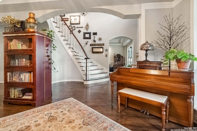 111 Kendall Oaks, Boerne, TX 78006 - entrance foyer with arched walkways, dark wood-type flooring, stairway, and baseboards