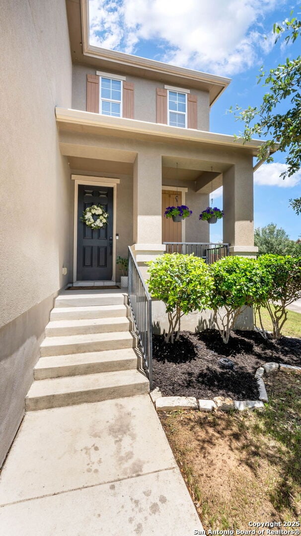 2527 Villa Rufina, San Antonio, TX 78259 - entrance to property featuring stucco siding and a porch