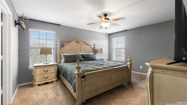 2527 Villa Rufina, San Antonio, TX 78259 - bedroom with light carpet, baseboards, and ceiling fan