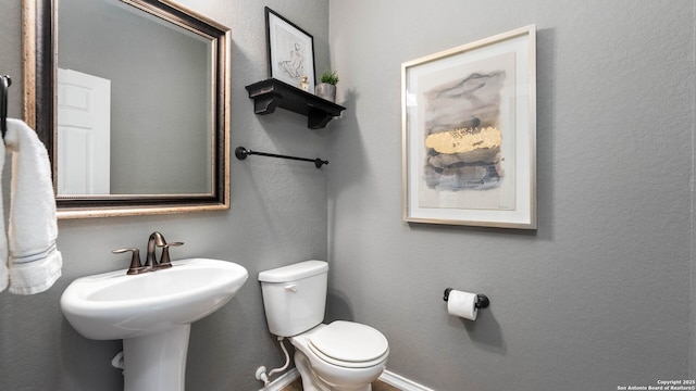 2527 Villa Rufina, San Antonio, TX 78259 - half bathroom featuring toilet and a sink