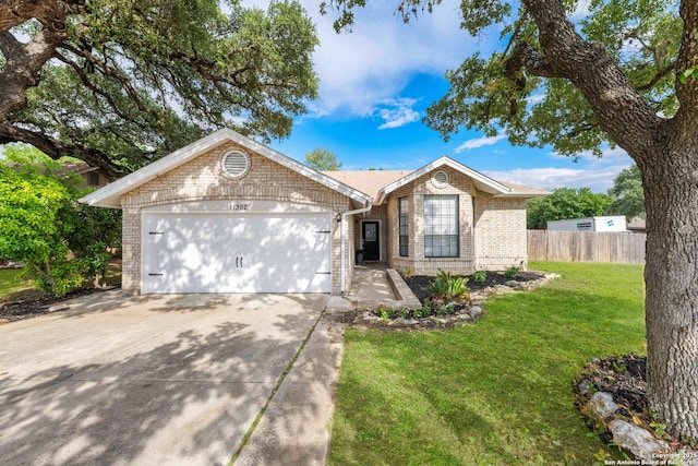 11302 Cedar Park, San Antonio, TX 78249 - ranch-style house featuring brick siding, concrete driveway, and a garage