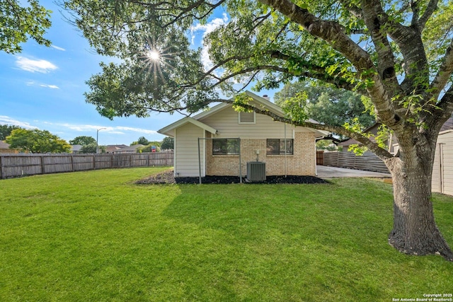 11302 Cedar Park, San Antonio, TX 78249 - back of property with brick siding and central AC unit