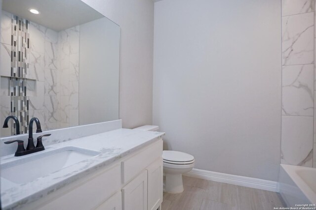 4862 Blue Jasmin, San Antonio, TX 78245 - full bathroom featuring toilet, baseboards, a tub to relax in, vanity, and a shower