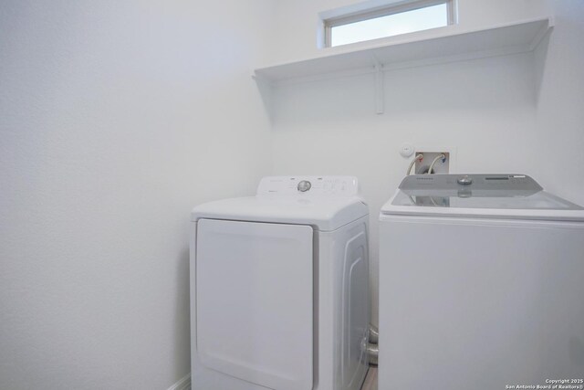 4862 Blue Jasmin, San Antonio, TX 78245 - laundry area with washer and clothes dryer