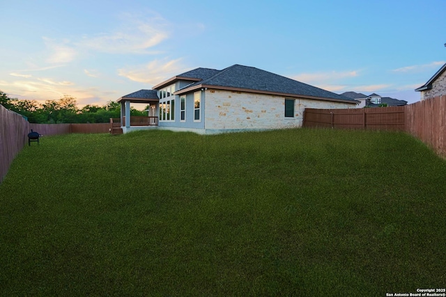 4862 Blue Jasmin, San Antonio, TX 78245 - rear view of house with stone siding