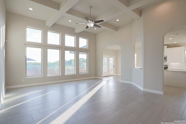 4862 Blue Jasmin, San Antonio, TX 78245 - spare room featuring arched walkways, a ceiling fan, coffered ceiling, recessed lighting, and beamed ceiling