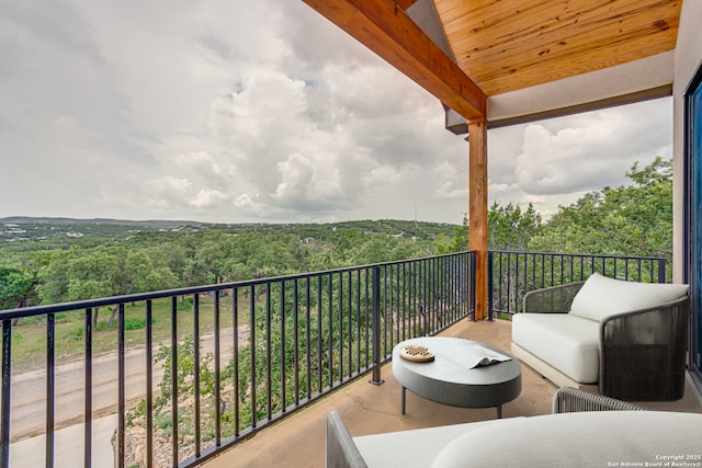 2191 Grandview Frst, Canyon Lake, TX 78133 - balcony featuring a forest view