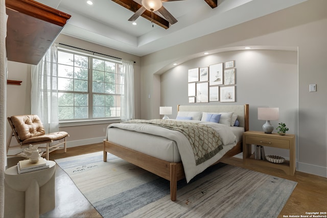 2191 Grandview Frst, Canyon Lake, TX 78133 - bedroom featuring baseboards, recessed lighting, a tray ceiling, and a ceiling fan