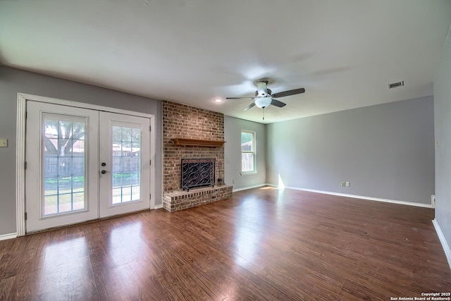 13811 Sunny Gln, San Antonio, TX 78217 - unfurnished living room with a ceiling fan, wood finished floors, baseboards, and french doors