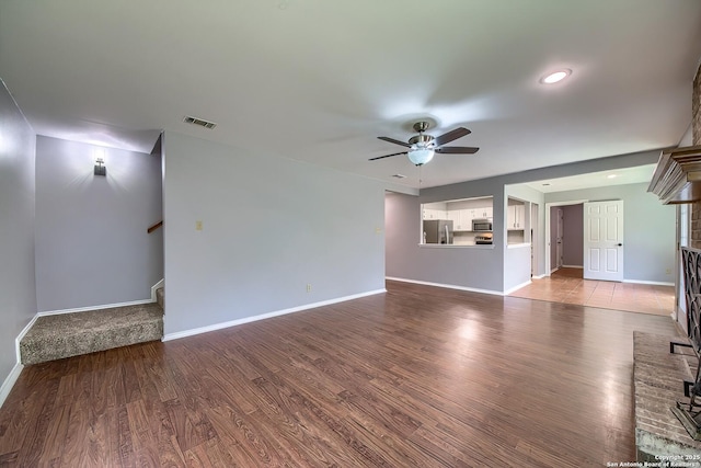 13811 Sunny Gln, San Antonio, TX 78217 - unfurnished living room with baseboards, a ceiling fan, wood finished floors, and recessed lighting