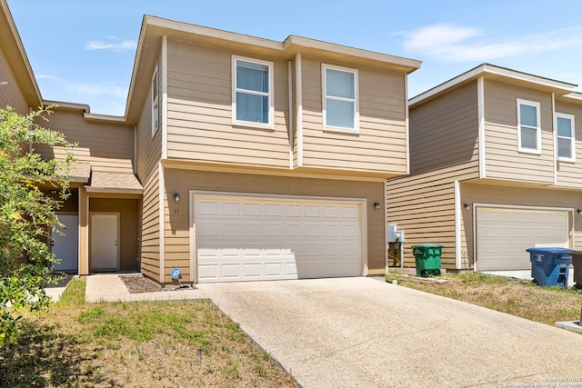 17 Oak Plz, San Antonio, TX 78216 - townhome / multi-family property with a garage and concrete driveway