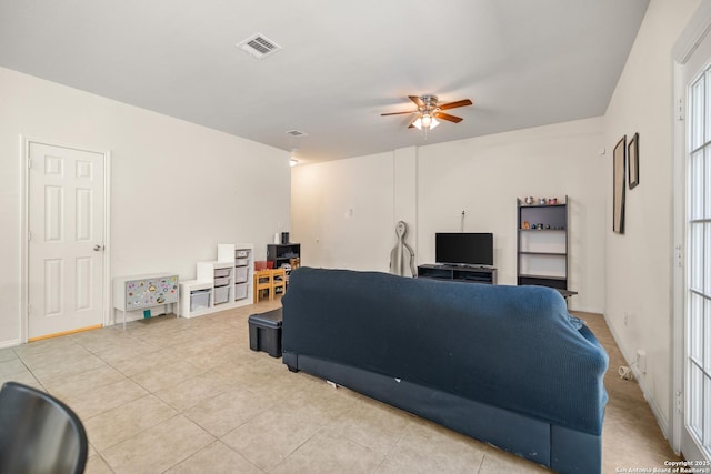 17 Oak Plz, San Antonio, TX 78216 - living room with a ceiling fan and light tile patterned floors