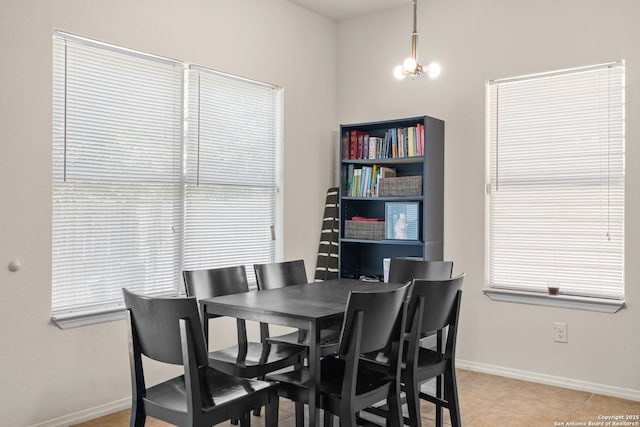 17 Oak Plz, San Antonio, TX 78216 - dining area with baseboards and light tile patterned flooring