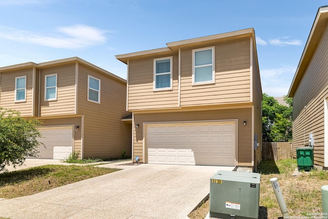 17 Oak Plz, San Antonio, TX 78216 - view of front of house featuring a garage, driveway, and fence