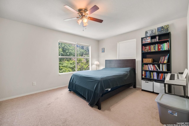 17 Oak Plz, San Antonio, TX 78216 - bedroom with carpet, baseboards, and a ceiling fan