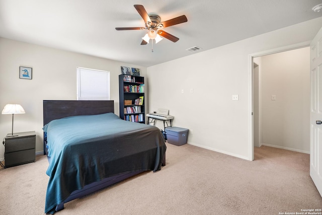 17 Oak Plz, San Antonio, TX 78216 - carpeted bedroom featuring ceiling fan and baseboards