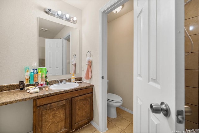 17 Oak Plz, San Antonio, TX 78216 - bathroom with tile patterned floors, vanity, and toilet