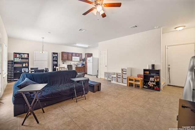 17 Oak Plz, San Antonio, TX 78216 - living area featuring a ceiling fan and light tile patterned flooring