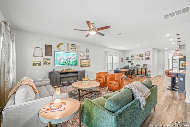 25826 Marigold Oaks, Boerne, TX 78006 - living room with ceiling fan, light wood-type flooring, recessed lighting, and baseboards