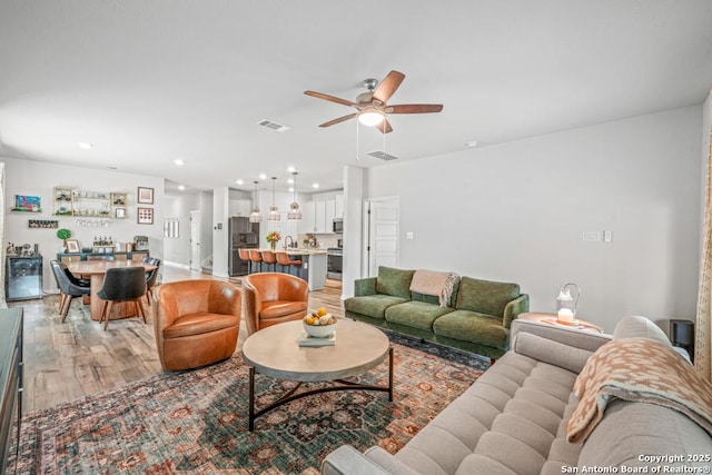 25826 Marigold Oaks, Boerne, TX 78006 - living room featuring a ceiling fan, light wood-type flooring, and recessed lighting