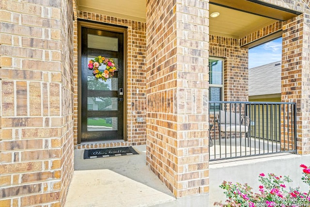 25826 Marigold Oaks, Boerne, TX 78006 - property entrance with brick siding and a porch
