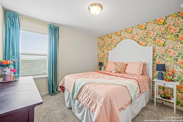 25826 Marigold Oaks, Boerne, TX 78006 - bedroom with wallpapered walls, light colored carpet, and baseboards