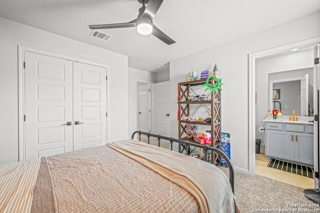 25826 Marigold Oaks, Boerne, TX 78006 - bedroom with a closet, light colored carpet, baseboards, and ceiling fan