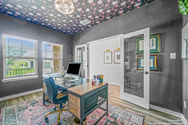 25826 Marigold Oaks, Boerne, TX 78006 - office with wood finished floors, french doors, baseboards, and a textured wall