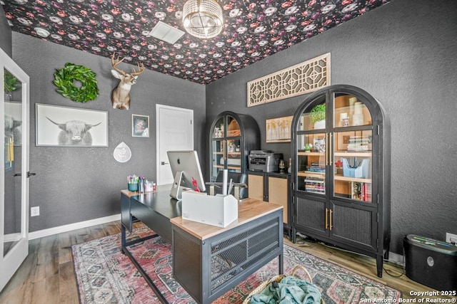 25826 Marigold Oaks, Boerne, TX 78006 - office space with a textured wall, wood finished floors, and baseboards