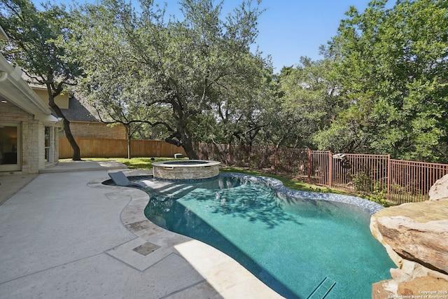 51 Stonewall Bnd, San Antonio, TX 78256 - view of swimming pool with a patio area, a fenced backyard, and a pool with connected hot tub