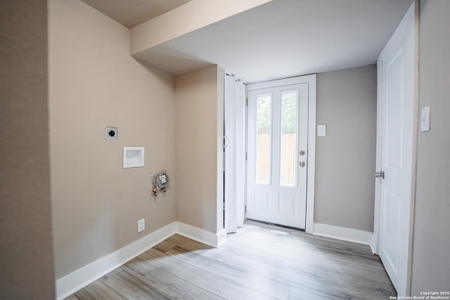 312 Avondale, San Antonio, TX 78223 - entrance foyer with light wood-style flooring and baseboards