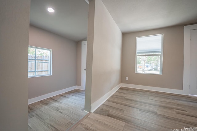 312 Avondale, San Antonio, TX 78223 - empty room featuring light wood-style floors, recessed lighting, and baseboards