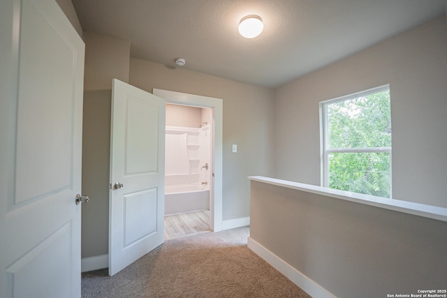 312 Avondale, San Antonio, TX 78223 - hall with light carpet and baseboards