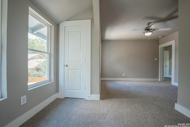 312 Avondale, San Antonio, TX 78223 - carpeted spare room with a ceiling fan, baseboards, and vaulted ceiling