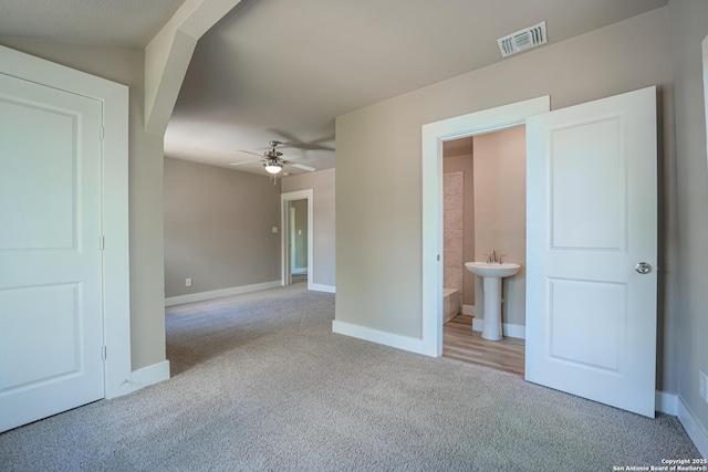 312 Avondale, San Antonio, TX 78223 - unfurnished room featuring light colored carpet, a ceiling fan, and baseboards