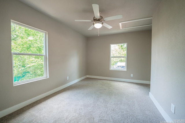 312 Avondale, San Antonio, TX 78223 - carpeted spare room featuring attic access, baseboards, and ceiling fan