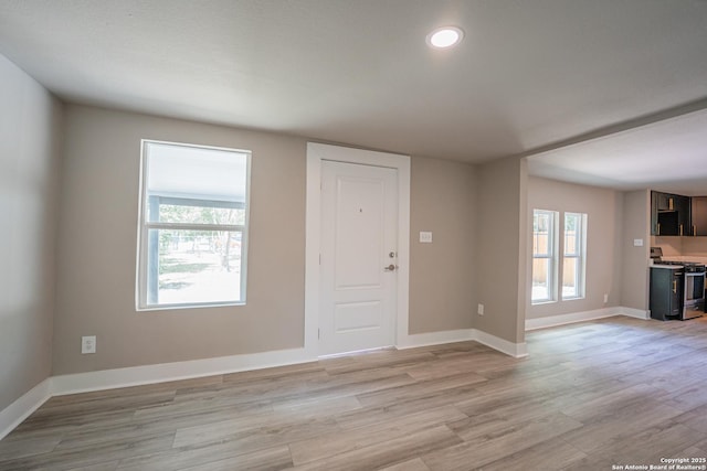 312 Avondale, San Antonio, TX 78223 - entrance foyer featuring light wood-type flooring, plenty of natural light, baseboards, and recessed lighting