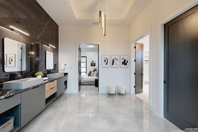 1356 Capitare, New Braunfels, TX 78132 - bathroom featuring double vanity, ensuite bathroom, and marble finish floors
