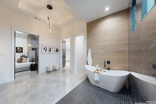 1356 Capitare, New Braunfels, TX 78132 - bathroom with a freestanding tub and tile walls
