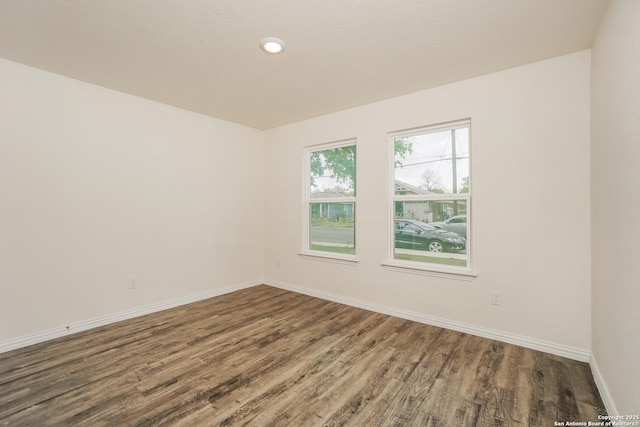 237 Corliss, San Antonio, TX 78220 - spare room with wood finished floors, baseboards, and recessed lighting