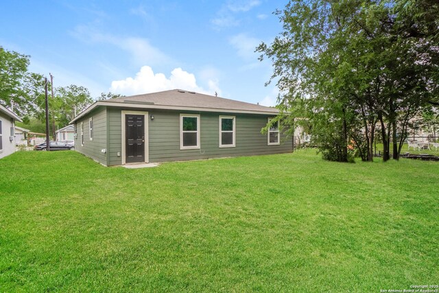 237 Corliss, San Antonio, TX 78220 - back of house with a yard