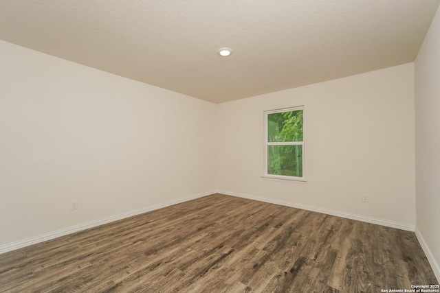 237 Corliss, San Antonio, TX 78220 - unfurnished room with dark wood-type flooring, baseboards, and recessed lighting