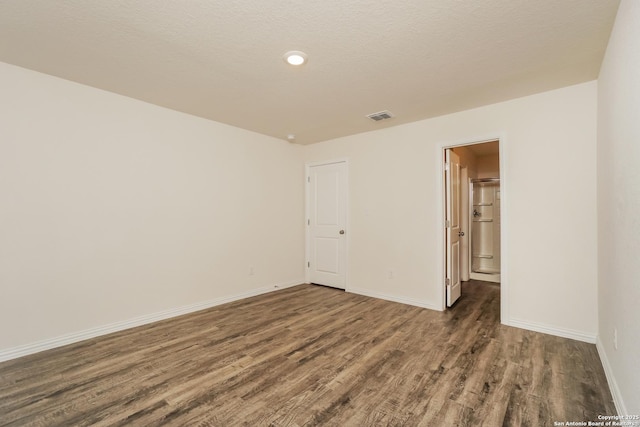 237 Corliss, San Antonio, TX 78220 - empty room with wood finished floors, baseboards, and recessed lighting
