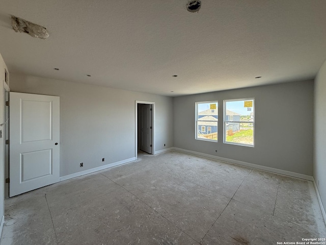 14724 Sycamore Xing, San Antonio, TX 78252 - empty room with baseboards and a pendent fire sprinkler