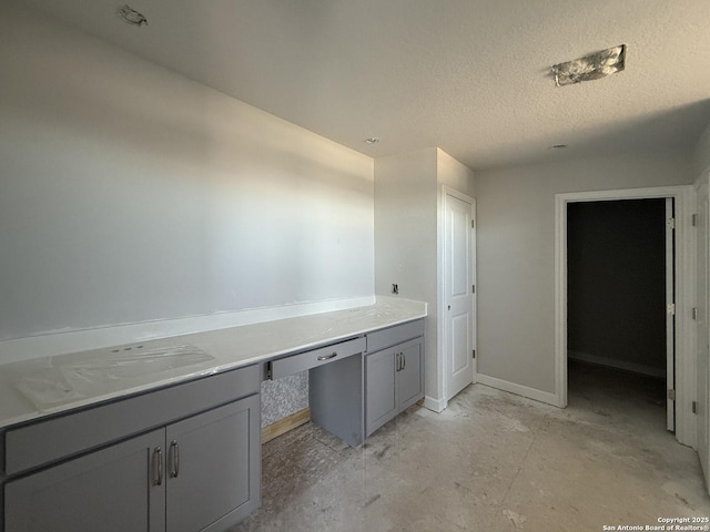 14724 Sycamore Xing, San Antonio, TX 78252 - bathroom featuring concrete flooring, baseboards, and a textured ceiling