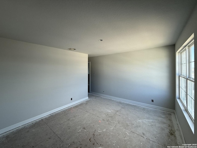 14724 Sycamore Xing, San Antonio, TX 78252 - spare room featuring baseboards